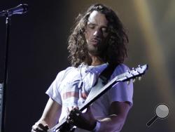 FILE - In this Sunday, Aug. 8, 2010, file photo, musician Chris Cornell of Soundgarden performs during the Lollapalooza music festival in Grant Park in Chicago. According to his representative, rocker Chris Cornell, who gained fame as the lead singer of Soundgarden and later Audioslave, has died Wednesday night in Detroit at age 52. (AP Photo/Nam Y. Huh, File)