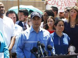 AP Photo/Cedar Attanasio Rep. Joaquin Castro speaks alongside members of the Hispanic Caucus after touring inside of the Border Patrol station in Clint, Texas, Monday, July 1, 2019. Castro's identical twin, presidential candidate Julian Castro, held a rally outside the building over the weekend.
