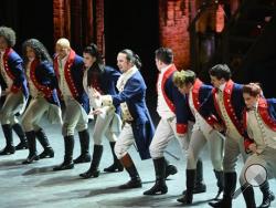 Lin-Manuel Miranda, center, and the cast of "Hamilton" perform at the Tony Awards at the Beacon Theatre on Sunday, June 12, 2016, in New York. (Photo by Evan Agostini/Invision/AP)