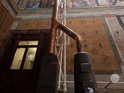 Furnaces and chimney pipes are installed at the Sistine Chapel ahead of the conclave at the Vatican on May 2, 2025. (USA TODAY Network)