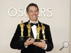 Sean Baker, winner of the awards for best original screenplay, best film editing, best director, and best picture for "Anora," poses in the press room at the Oscars on Sunday, March 2, 2025, at the Dolby Theatre in Los Angeles. (Photo by Jordan Strauss/Invision/AP) poses in the press room at the Oscars on Sunday, March 2, 2025, at the Dolby Theatre in Los Angeles. (Photo by Jordan Strauss/Invision/AP)