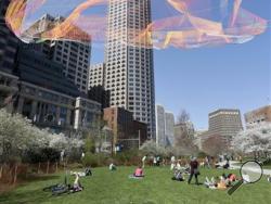A work by Rose Eschelman hovers over the Rose Kennedy Greenway on Sunday. (AP Photo/Steven Senne) 