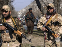 FILE - Taliban fighters stand guard in Kabul, Afghanistan, on Dec. 26, 2022. (AP Photo/Ebrahim Noroozi, File)