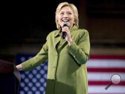 In this Friday, July 22, 2016 file photo, Democratic presidential candidate Hillary Clinton speaks at a rally in Entertainment Hall at the Florida State Fairgrounds in Tampa. (AP Photo/Andrew Harnik, File)