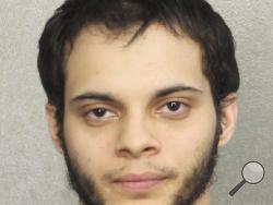 This booking photo provided by the Broward Sheriff's Office shows suspect Esteban Ruiz Santiago, 26, Saturday, Jan. 7, 2017, in Fort Lauderdale, Fla. (Broward Sheriff's Office via AP)