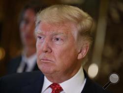 President-elect Donald Trump listens to a reporters question at Trump Tower in New York, Monday, Jan. 9, 2017. (AP Photo/Evan Vucci)