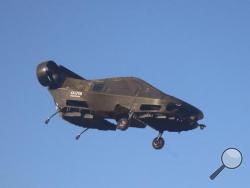This image provided by Urban Aeronautics/Tactical Robotics shows an Israeli-made flying car. Urban Aeronautics conducted flight tests of its passenger-carrying drone call the Cormorant in Megiddo, Israel, late in 2016. The company says the aircraft can fly between buildings and below power lines, attain speeds up to 115 mph, stay aloft for an hour and carry up to 1,100 pounds. (Urban Aeronautics/Tactical Robotics via AP)