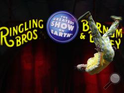 A Ringling Bros. and Barnum & Bailey clown does a somersault during a performance Saturday, Jan. 14, 2017, in Orlando, Fla. The Ringling Bros. and Barnum & Bailey Circus will end the "The Greatest Show on Earth" in May, following a 146-year run of performances. Kenneth Feld, the chairman and CEO of Feld Entertainment, which owns the circus, told The Associated Press, declining attendance combined with high operating costs are among the reasons for closing. (AP Photo/Chris O'Meara)