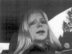 FILE - In this undated file photo provided by the U.S. Army, Pfc. Chelsea Manning poses for a photo wearing a wig and lipstick. On Tuesday, Jan. 17, 2017, President Barack Obama commuted the sentence of Chelsea Manning, who leaked Army documents and is serving 35 years. (U.S. Army via AP, File)