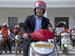  In this Dec. 13, 2016, file photo, Uber CEO Travis Kalanick, poses during the launch of its bike-sharing product, uberMOTO, in Hyderabad, India. Kalanick has quit President Donald Trump's council of business leaders, according to an internal memo obtained by The Associated Press. (AP Photo/Mahesh Kumar A., File)