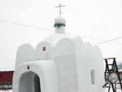 In this image made from video, a chapel made of snow is seen in Sosnovka, Russia, Wednesday, Feb. 8, 2017. Sosnovka resident Alexander Batyokhtin has built a church in this village in Siberia made entirely of snow. Batyokhtin was constructing the chapel each day for nearly two months even temperatures plunged below minus 30 degrees Celsius (-22 Fahrenheit). He used 12 cubic metres (424 cubic feet) of snow to make it in the village in the Omsk region. (AP Photo)