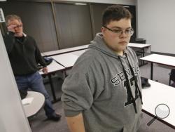 Gloucester County High School senior Gavin Grimm, a transgender student, arrives for a news conference in Richmond, Va., Monday, March 6, 2017. The Supreme Court is handing the Gloucester High School transgender teen's case back to a lower court without reaching a decision. (AP Photo/Steve Helber)