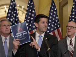 House Speaker Paul Ryan of Wis., center, standing with Energy and Commerce Committee Chairman Greg Walden, R-Ore., right, and House Majority Whip Kevin McCarthy, R-Calif., left, speaks during a news conference on the American Health Care Act on Capitol Hill in Washington, Tuesday, March 7, 2017. (AP Photo/Susan Walsh)