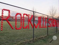 Plastic cups spell out Rockville Strong, at Rockville High School in Rockville, Maryland, on Thursday, March 23, 2017. The school has been thrust into the national immigration debate after a 14-year-old student said she was raped in a bathroom, allegedly by two classmates, including one who authorities said came to the U.S. illegally from Central America. (AP Photo/Brian Witte)