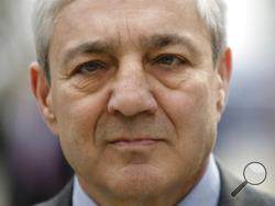 Former Penn State president Graham Spanier walks from the Dauphin County Courthouse in Harrisburg, Pa., Friday, March 24, 2017. Spanier was convicted Friday of hushing up suspected child sex abuse in 2001 by Jerry Sandusky, whose arrest a decade later blew up into a major scandal for the university and led to the firing of beloved football coach Joe Paterno. (AP Photo/Matt Rourke)