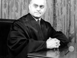 FILE - In this Feb. 4, 1939, file photo, Felix Frankfurter, the new associate justice of the United States Supreme Court, poses in his judicial robe for his portrait in Washington. Supreme Court nominations became politically contentious about 222 years ago when the Senate voted down George Washington’s choice for chief justice. Even some who have made it to the court endured difficult confirmations. Frankfurter’s loyalty to the United States was questioned because of his birth in Austria, his Judaism and h