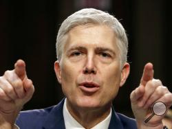 FILE - In this March 22, 2017, file photo, Supreme Court nominee Judge Neil Gorsuch speaks during his confirmation hearing, on Capitol Hill in Washington. Gorsuch’s confirmation as the 113th Supreme Court justice is expected on April 7. It won’t be long before he starts revealing what he really thinks about a range of hot topics he repeatedly sidestepped during his confirmation hearing.(AP Photo/J. Scott Applewhite, File)