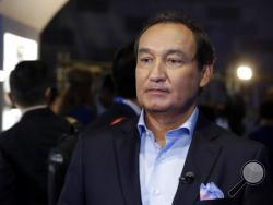 FILE - In this Thursday, June 2, 2016, file photo, United Airlines CEO Oscar Munoz waits to be interviewed, in New York, during a presentation of the carrier's new Polaris service, a new business class product that will become available on trans-Atlantic flights. Munoz said in a note to employees Tuesday, April 11, 2017, that he continues to be disturbed by the incident Sunday night in Chicago, where a passenger was forcibly removed from a United Express flight. Munoz said he was committed to “fix what’s br