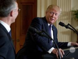 President Donald Trump accompanied by NATO Secretary General Jens Stoltenberg, speaks at a news conference in the East Room at the White House in Washington, Wednesday, April 12, 2017, in Washington. (AP Photo/Andrew Harnik)