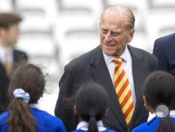 FILE - In this Wednesday, May 3, 2017 file photo Britain's Prince Philip, the Duke of Edinburgh, smiles during his visit to Lord's Cricket Ground to open the new Warner Stand, in London. Buckingham Palace said Thursday May 4, 2017 that Prince Philip will no longer carry out engagements starting this fall. (Arthur Edward/Pool Photo via AP)