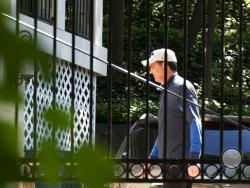 Former FBI Director James Comey walks at his home in McLean, Va., Wednesday, May 10, 2017. President Donald Trump fired Comey on Tuesday, ousting the nation's top law enforcement official in the midst of an investigation into whether Trump's campaign had ties to Russia's election meddling. (AP Photo/Sait Serkan Gurbuz)