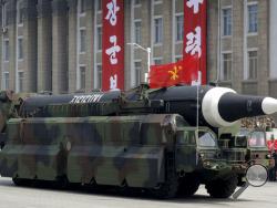 In this April 15, 2017, file photo, an unidentified missile that analysts believe could be the North Korean Hwasong-12 is paraded across Kim Il Sung Square in Pyongyang. The country's official Korean Central News Agency said the missile fired Sunday, May 14, 2017, was a Hwasong-12 "capable of carrying a large-size heavy nuclear warhead." The Hwasong-10 appeared in the military parade in Pyongyang on April 15, 2017, followed by this unidentified missile. (AP Photo/Wong Maye-E, File)