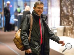 In this Jan. 3, 2017, file photo, Michael Flynn, then - President-elect Donald Trump's nominee for National Security Adviser arrives at Trump Tower in New York. Flynn will provide some documents to the Senate intelligence committee as part of its probe into Russia’s meddling in the 2016 election. A person close to Flynn says that he will be turning over documents related to two of his businesses as well as some personal documents that the committee requested in May 2017. The person says that Flynn plans to 