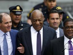 Bill Cosby walks from the Montgomery County Courthouse during his sexual assault trial, Tuesday, June 6, 2017, in Norristown, Pa. (AP Photo/Matt Slocum)