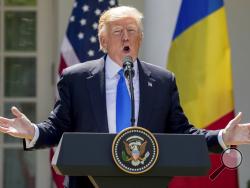 President Donald Trump speaks during a news conference with Romanian President Klaus Werner Iohannis in the Rose Garden at the White House, Friday, June 9, 2017, in Washington. (AP Photo/Andrew Harnik)