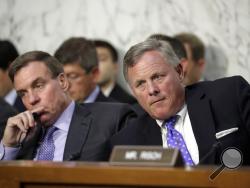  Sen. Richard Burr, R-N.C., right, chairman of the Senate Select Committee on Intelligence, and Vice Chairman Mark Warner, D-Va., left, listen as Attorney General Jeff Sessions testifies before the Senate Select Committee on Intelligence about his role in the firing of FBI Director James Comey and the investigation into contacts between Trump campaign associates and Russia, on Capitol Hill in Washington, Tuesday, June 13, 2017. (AP Photo/J. Scott Applewhite)