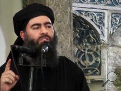  FILE - This file image made from video posted on a militant website Saturday, July 5, 2014, purports to show the leader of the Islamic State group, Abu Bakr al-Baghdadi, delivering a sermon at a mosque in Iraq during his first public appearance. The Russian military claims it has killed the leader of the Islamic State group in an airstrike. The ministry said Friday, June 16, 2017, that Abu Bakr al-Baghdadi was killed in a Russian strike in late May along with other senior group commanders. (AP Photo/Milit