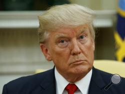 President Donald Trump listens in the Oval Office of the White House in Washington, Monday, June 26, 2017. Democrats are out to capitalize on what they believe is growing public sentiment that President Donald Trump, the richest man to call the White House home, is turning his back on the regular people who got him elected in favor of his wealthy peers. The party is hoping that pitch will pack extra oomph at a time when even some Republicans are raising concerns that the GOP health-care plan could hurt th