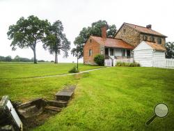 This June 23, 2017, photo shows the Historic Bushman House that survived the Battle of Gettysburg, Pa. For a couple hundred dollars, you can spend the night in the house. (Sean Simmers/PennLive.com via AP)