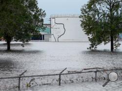 The Arkema Inc. chemical plant is flooded from Tropical Storm Harvey, Wednesday, Aug. 30, 2017, in Crosby, Texas. The plant, about 25 miles (40.23 kilometers) northeast of Houston, lost power and its backup generators amid Harvey’s dayslong deluge, leaving it without refrigeration for chemicals that become volatile as the temperature rises. (Godofredo A. Vasquez/Houston Chronicle via AP)
