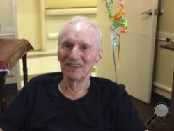 This April 17, 2017 photo provided by Devin Zaring shows Ronald Zaring celebrates his birthday at Friendswood Health Care Center in Friendswood, Texas. On Tuesday, Aug. 29, 82-year-old Ronald Zaring died on a rescue bus on the way to a hospital. His son, Devin Zaring, said that after the storm hit, he knew there was no way he could get to the nursing home in Friendswood where his father, a Navy vet and retired medical supplies salesman, was living after an Alzheimer’s diagnosis. (Devin Zaring via AP)