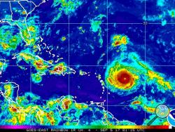 This Monday, Sept. 4, 2017, satellite image provided by the National Oceanic and Atmospheric Administration shows Hurricane Irma nearing the eastern Caribbean. Hurricane Irma grew into a powerful Category 4 storm Monday. (NOAA via AP)
