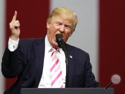 President Donald Trump speaks at a campaign rally in support of Sen. Luther Strange, Friday, Sept. 22, 2017, in Huntsville, Ala. (AP Photo/Brynn Anderson)