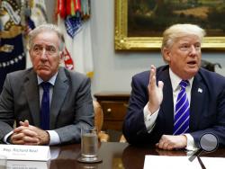 Rep. Richard Neal, D-Mass., listens as President Donald Trump speaks during a meeting with members of the House Ways and Means committee in the Roosevelt Room of the White House, Tuesday, Sept. 26, 2017, in Washington. (AP Photo/Evan Vucci)