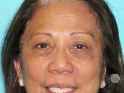 This undated photo provided by the Las Vegas Metropolitan Police Department shows Marilou Danley. Girlfriend of the active shooter in the Sunday, Oct. 1, 2017, incident, Danley, 62, returned to the United States from the Philippines on Tuesday night and was met at Los Angeles International Airport by FBI agents, according to a law enforcement official. (Las Vegas Metropolitan Police Department via AP)