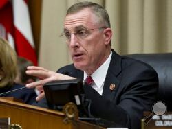  In this April 1, 2014, file photo, U.S. Rep. Tim Murphy, R-Pa., chairman of the House Energy and Commerce subcommittee on Oversight and Investigations. speaks at a hearing. (AP Photo/J. Scott Applewhite, File)