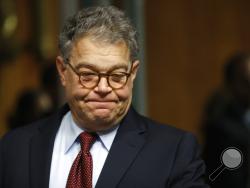 FILE - In this July 12, 2017 file photo, Senate Judiciary Committee member Sen. Al Franken, D-Minn. arrives on Capitol Hill in Washington. A Los Angeles radio host says Franken forcibly kissed her during a 2006 USO tour in the Middle East. Franken's staff has not yet responded to a request for comment. (AP Photo/Pablo Martinez Monsivais)