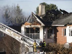 Firefighters continue to work the scene of a fire at the the Barclay Friends Senior Living Community in West Chester, Pa., Friday, Nov. 17, 2017. (AP Photo/Matt Rourke)