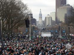 Fans line Benjamin Franklin Parkway before a Super Bowl victory parade for the Philadelphia Eagles football team, Thursday, Feb. 8, 2018, in Philadelphia. The Eagles beat the New England Patriots 41-33 in Super Bowl 52. (AP Photo/Alex Brandon)