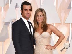 FILE - In this Feb. 22, 2015 file photo, Justin Theroux, left, and Jennifer Aniston arrive at the Oscars in Los Angeles. The couple announced Thursday, Feb. 15, 2018, that they have separated. (Photo by Jordan Strauss/Invision/AP)