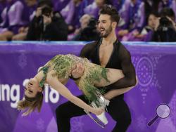 Gabriella Papadakis and Guillaume Cizeron of France perform during the ice dance, short dance figure skating in the Gangneung Ice Arena at the 2018 Winter Olympics in Gangneung, South Korea, Monday, Feb. 19, 2018. (AP Photo/David J. Phillip)
