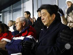 FILE - In this Feb. 9, 2018, file photo, Japanese Prime Minister Shinzo Abe, right, sits alongside Vice President Mike Pence, center, and second lady Karen Pence at the opening ceremony of the 2018 Winter Olympics in Pyeongchang, South Korea, Friday, Feb. 9, 2018. Pence was all set to hold a history-making meeting with North Korean officials during the Winter Olympics in South Korea, but Kim Jong Un's government canceled at the last minute, the Trump administration said Tuesday, Feb. 20. (AP Photo/Patrick S