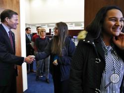 Lexi Offstein, 17, center, and Jade Tywang, 17, right, both students from Marjory Stoneman Douglas High School in Parkland, Fla., meet with Sen. Richard Blumenthal, D-Conn., left, Friday March 23, 2018, on Capitol Hill in Washington. Students from Parkland came to Washington to push Congress for gun control ahead of the Saturday March For Our Lives. The students asked Blumenthal for lessons learned after the shootings at Sandy Hook Elementary. (AP Photo/Jacquelyn Martin)