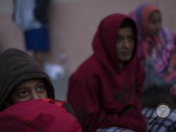 Central American migrants traveling with a caravan rest at the Salvation Army shelter for men upon arrival to Tijuana, Mexico, Thursday, April 26, 2018. Caravans have been a fairly common tactic for years among advocacy groups to bring attention to Central American citizens seeking asylum in the U.S. to escape political persecution or criminal threats from gangs. (AP Photo/Hans-Maximo Musielik)