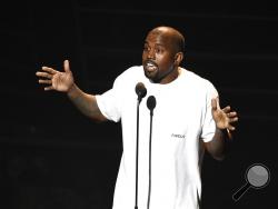 FILE - In this Aug. 28, 2016, file photo. Kanye West appears at the MTV Video Music Awards at Madison Square Garden in New York. West has called American slavery “a choice.” In an interview Tuesday on “TMZ Live,” West said, “When you hear about slavery for 400 years, for 400 years, that sounds like a choice.” West also told TMZ that he became addicted to opioids that doctors prescribed after he had surgery for liposuction in 2016. He was hospitalized for a week and had to cut short a tour. (Photo by Chris P