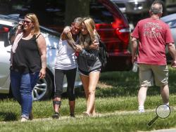 Scene near Noblesville High School on Friday, May 25, 2018, at Noblesville West Middle School in Noblesville, Ind., after a shooting on Friday, May 25, 2018. A male student opened fire at the suburban Indianapolis school wounding another student and a teacher before being taken into custody, authorities said. (Kelly Wilkinson/The Indianapolis Star via AP)